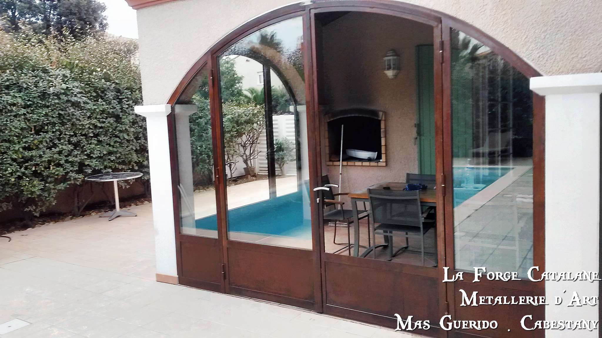 porte etanche cintree vitrage blinde forge catalane 4.jpg